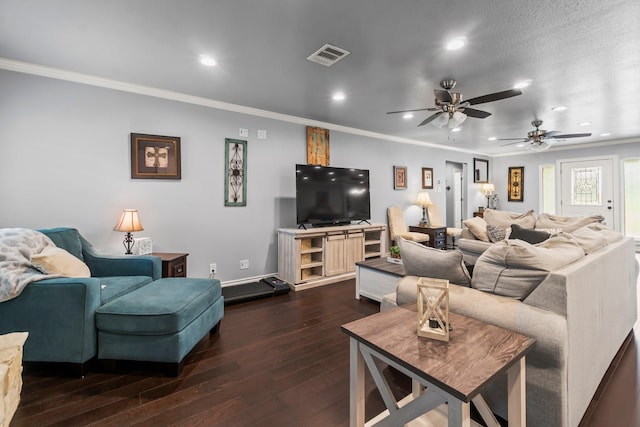 living area with visible vents, dark wood finished floors, ornamental molding, recessed lighting, and a ceiling fan