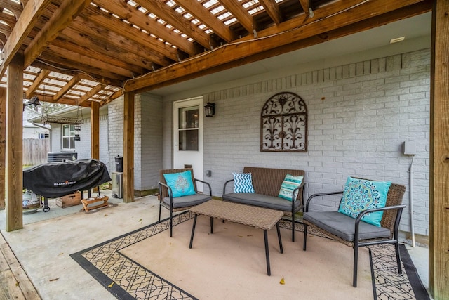 view of patio / terrace with a pergola and grilling area