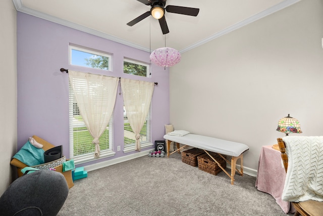 playroom with a ceiling fan, baseboards, carpet, and crown molding