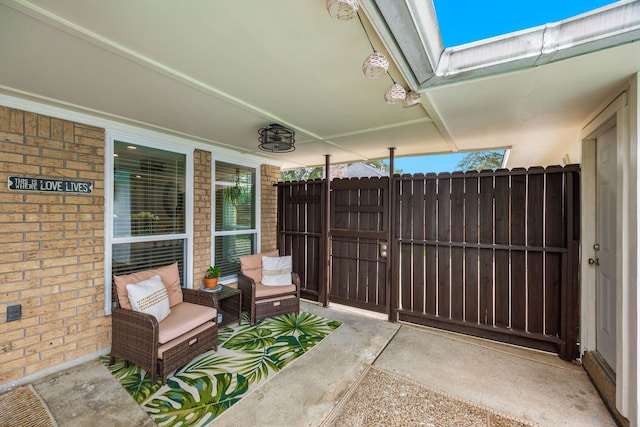 view of patio / terrace featuring fence