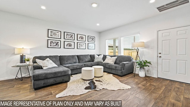 living room with recessed lighting, wood finished floors, visible vents, and baseboards