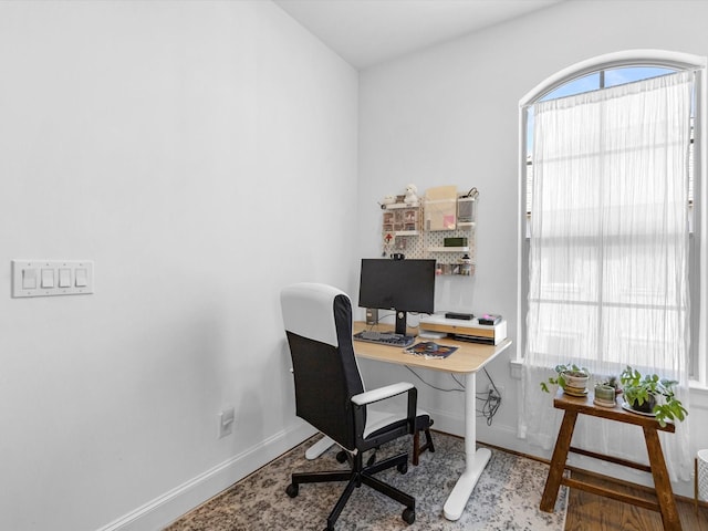 office area featuring baseboards