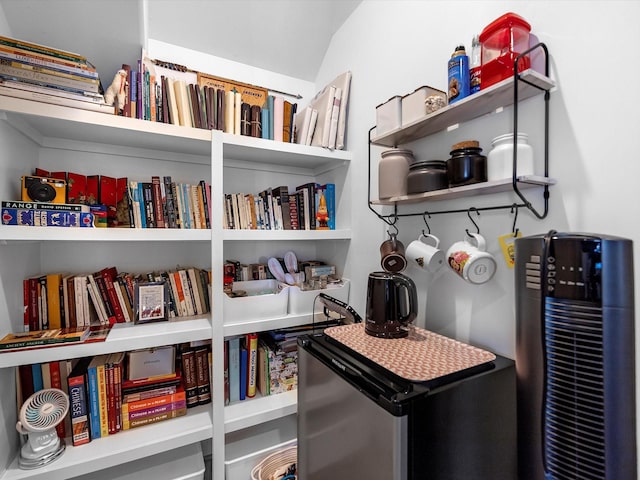 interior details featuring freestanding refrigerator