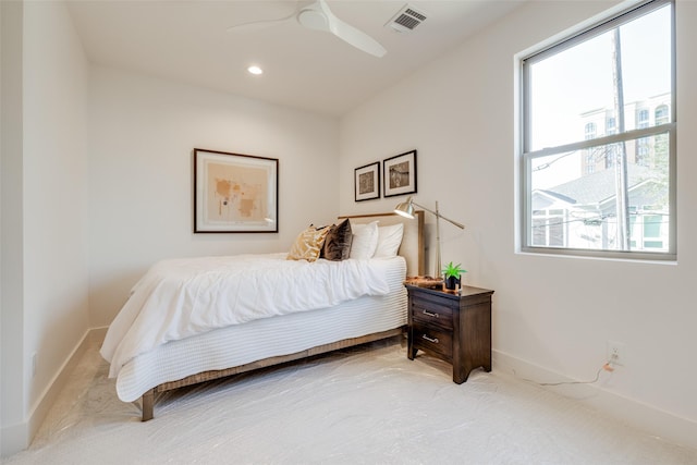 carpeted bedroom featuring visible vents, recessed lighting, baseboards, and ceiling fan