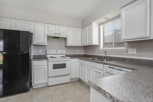 kitchen featuring a sink, white appliances, under cabinet range hood, and white cabinetry