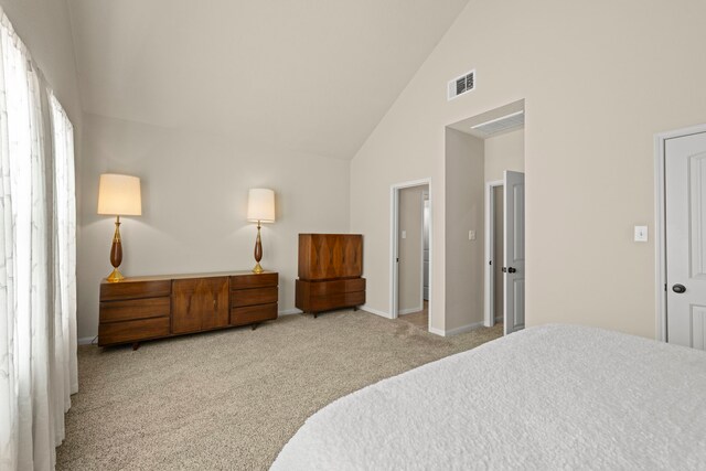 14864 Cetus Ct, Willis, TX 77318 - bedroom featuring high vaulted ceiling, carpet flooring, and baseboards