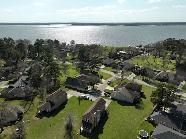 bird's eye view featuring a residential view and a water view