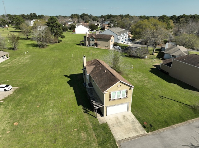 drone / aerial view with a residential view