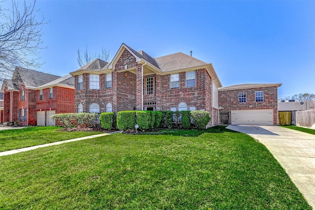 view of front of property with a garage, a front yard, brick siding, and driveway