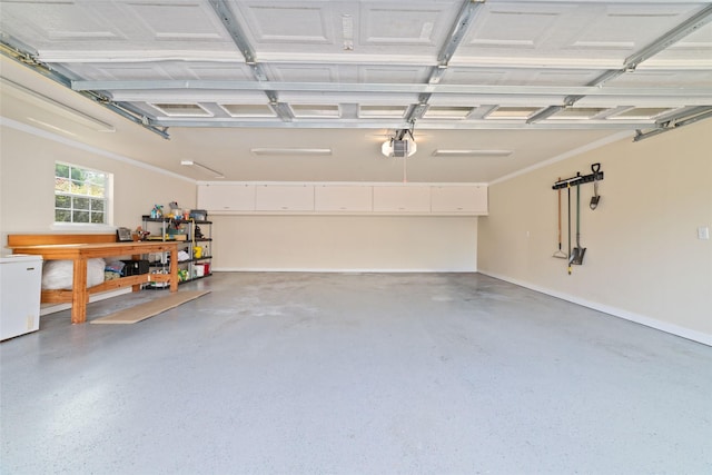 garage featuring a workshop area, refrigerator, and a garage door opener