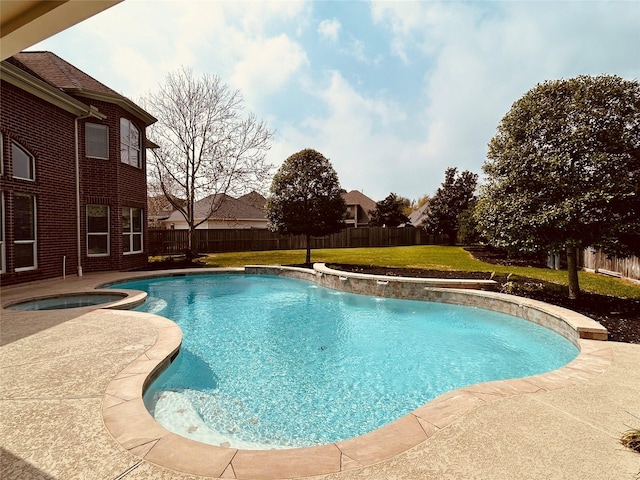 view of swimming pool featuring a fenced in pool, a lawn, a fenced backyard, an in ground hot tub, and a patio