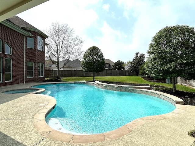 view of pool with a fenced in pool, an in ground hot tub, a lawn, and a fenced backyard