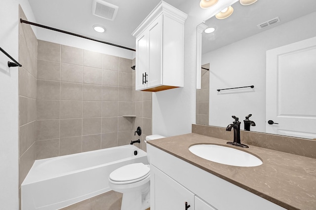 full bath featuring visible vents, toilet, shower / washtub combination, and vanity