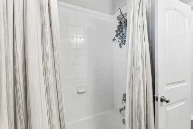 full bath featuring shower / tub combo with curtain