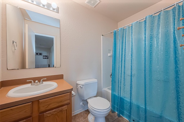 full bathroom featuring visible vents, shower / tub combo, toilet, and vanity