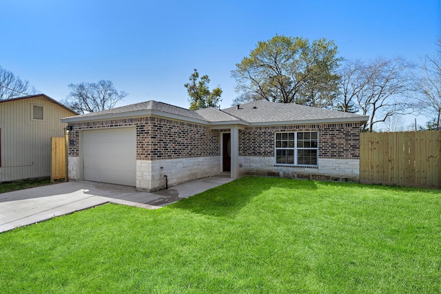 ranch-style home with a front lawn, fence, roof with shingles, driveway, and an attached garage