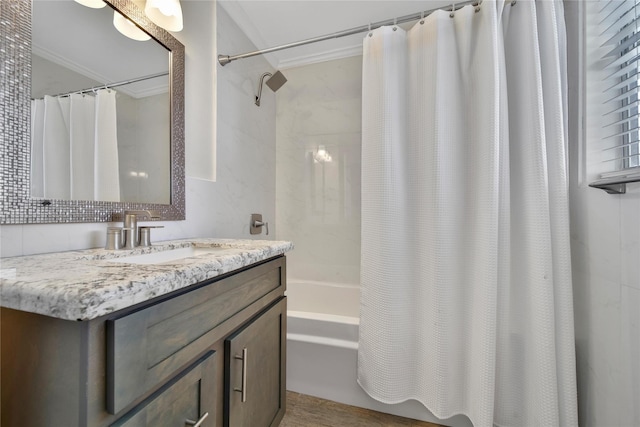 full bathroom featuring shower / tub combo with curtain, ornamental molding, and vanity