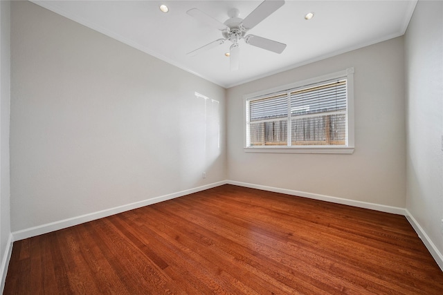 empty room with ceiling fan, baseboards, and ornamental molding