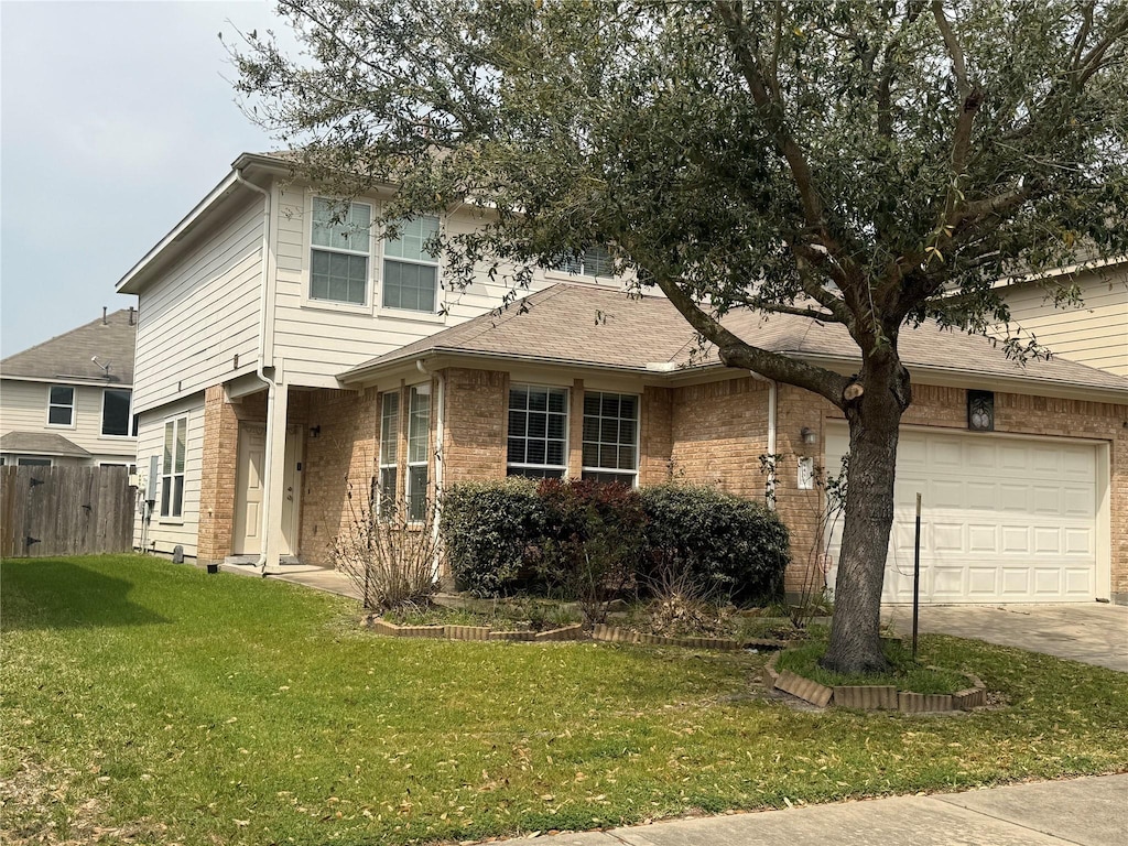 view of home's exterior featuring fence, driveway, a yard, a garage, and brick siding