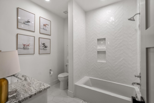 full bathroom with tile patterned floors, toilet, baseboards, bathing tub / shower combination, and vanity