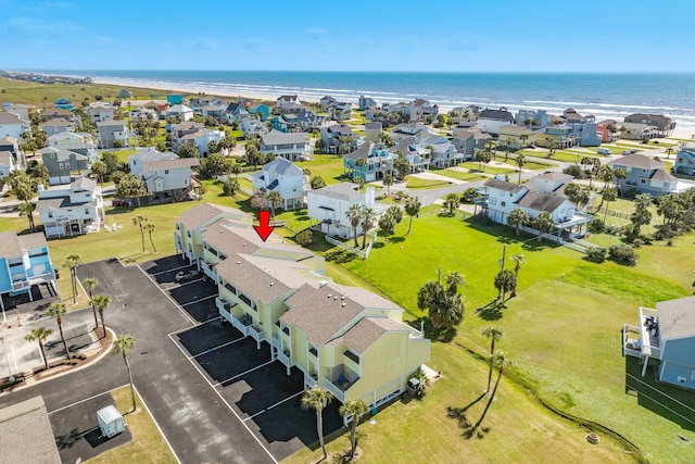 birds eye view of property with a residential view and a water view