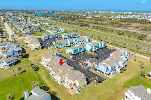 aerial view with a water view and a residential view