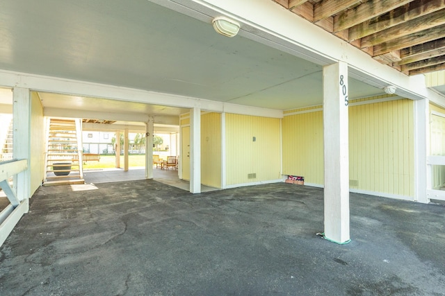 view of patio featuring an attached carport