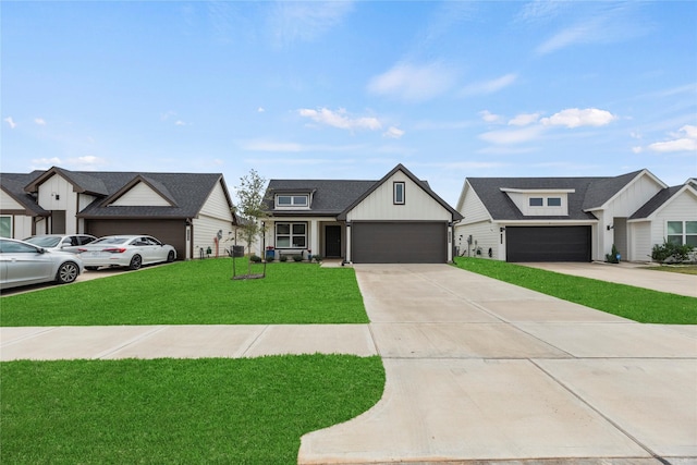 modern inspired farmhouse featuring driveway, an attached garage, a front lawn, and board and batten siding