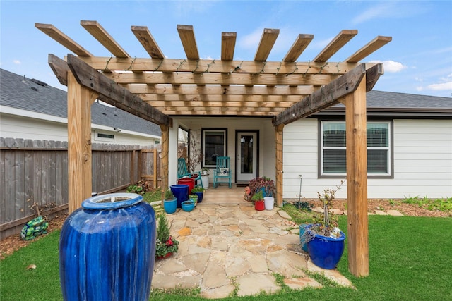 view of patio / terrace featuring a pergola and fence