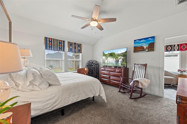 carpeted bedroom featuring visible vents, ceiling fan, and vaulted ceiling