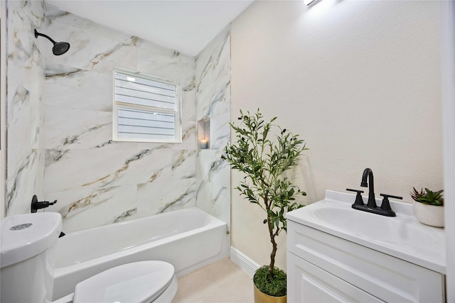 bathroom featuring washtub / shower combination, toilet, and vanity