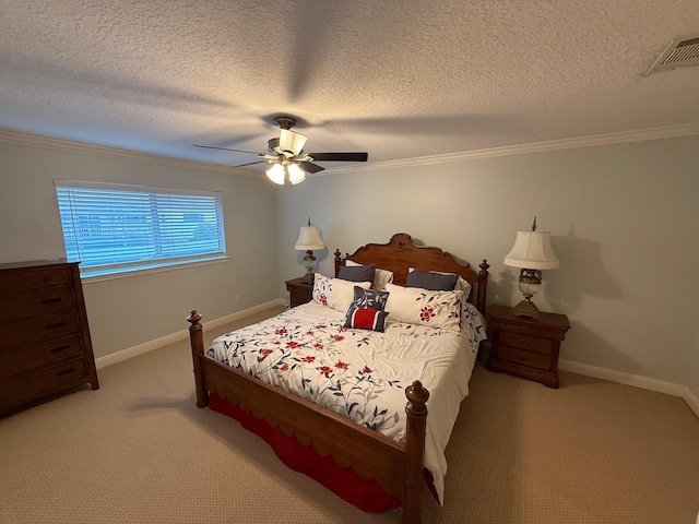 carpeted bedroom with baseboards, visible vents, and ornamental molding