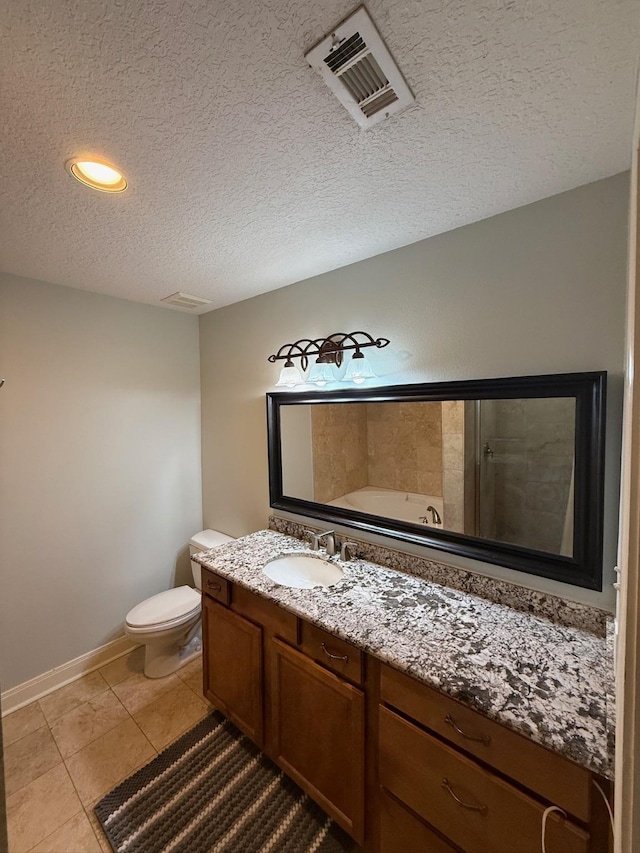 full bathroom with vanity, visible vents, tile patterned flooring, a textured ceiling, and toilet