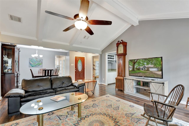 living room with visible vents, ceiling fan with notable chandelier, vaulted ceiling with beams, and wood finished floors