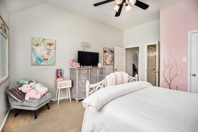 bedroom with baseboards, lofted ceiling, ceiling fan, and carpet flooring