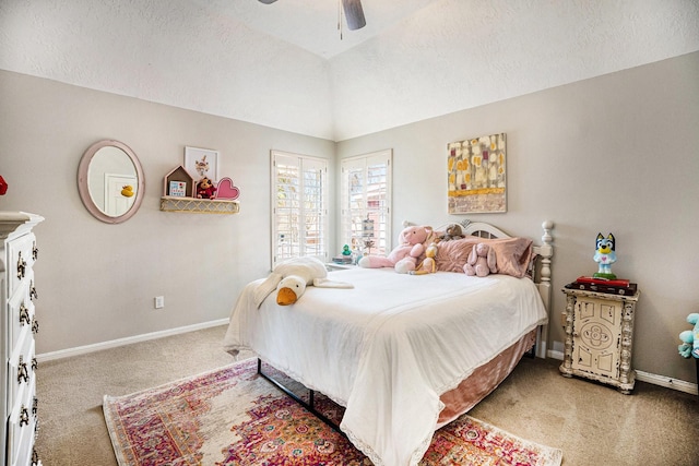 bedroom featuring vaulted ceiling, carpet, baseboards, and a textured ceiling