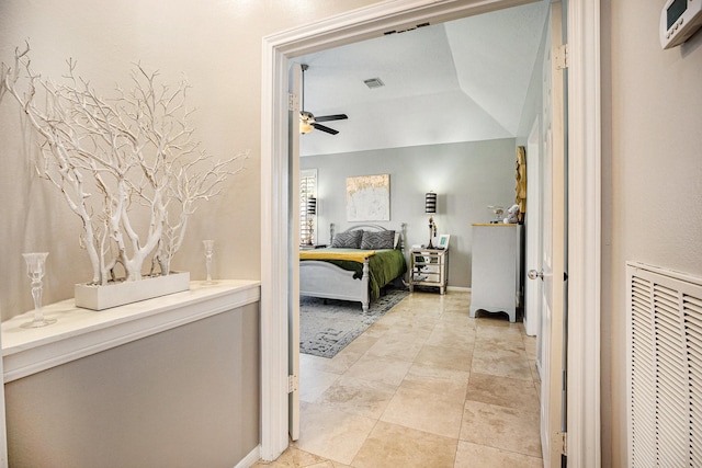 interior space featuring visible vents, baseboards, and ceiling fan