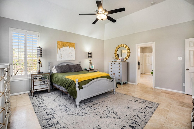 bedroom with baseboards, lofted ceiling, and ceiling fan