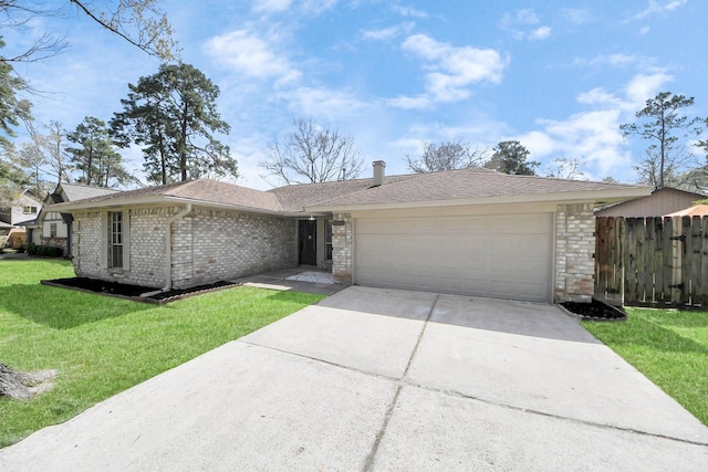 ranch-style home featuring fence, a front lawn, concrete driveway, a garage, and brick siding