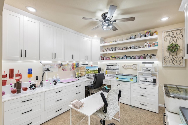 home office with recessed lighting, ceiling fan, and built in desk