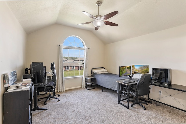 bedroom featuring carpet, baseboards, lofted ceiling, ceiling fan, and a textured ceiling