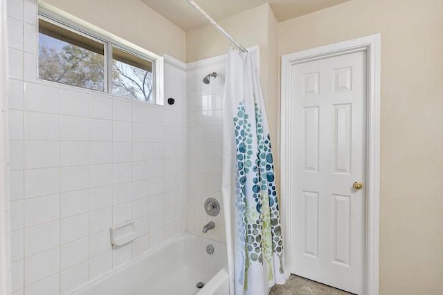 full bath featuring shower / tub combo with curtain