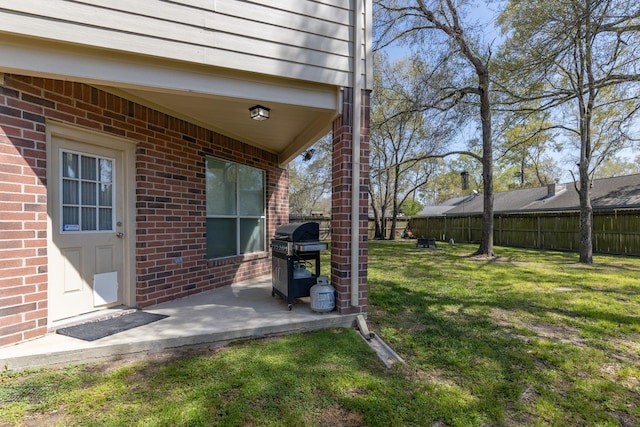 view of yard featuring a patio and a fenced backyard