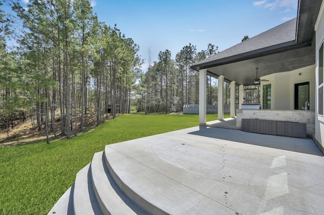 view of patio / terrace with a ceiling fan