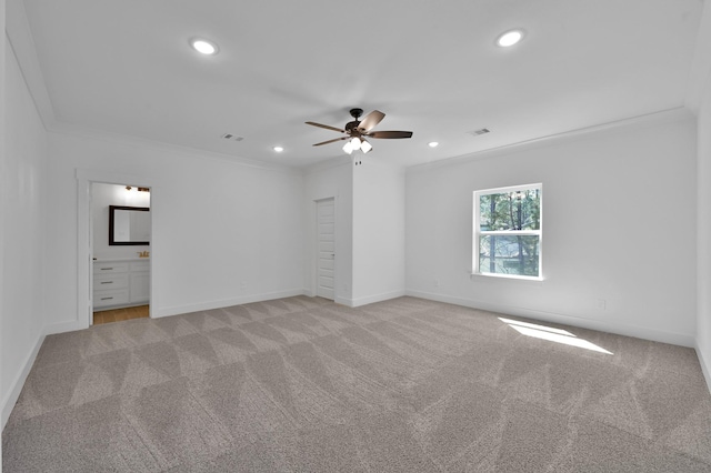 empty room featuring visible vents, light carpet, ornamental molding, recessed lighting, and ceiling fan