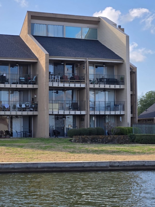 view of property with a water view