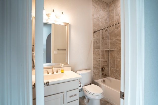 full bathroom with washtub / shower combination, toilet, and vanity