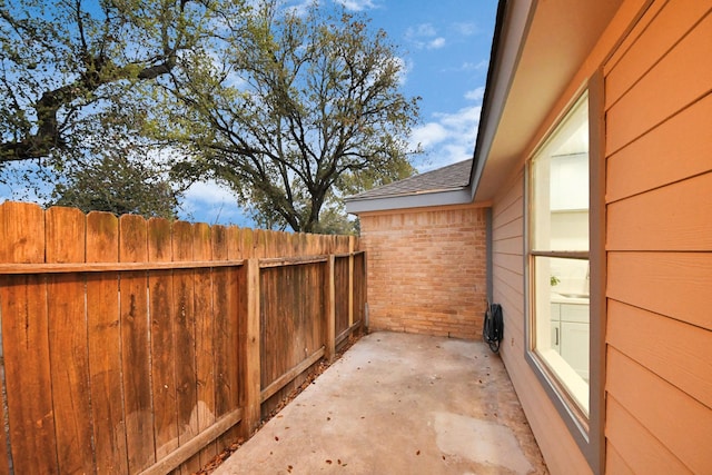 view of patio with fence