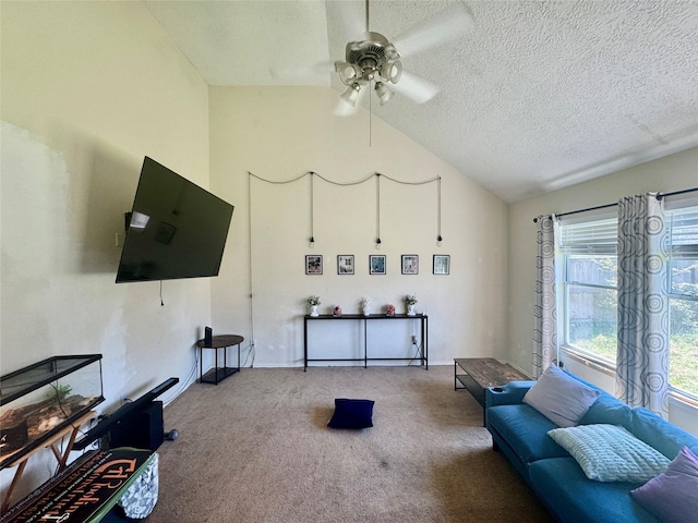 carpeted living area featuring lofted ceiling, a textured ceiling, and ceiling fan