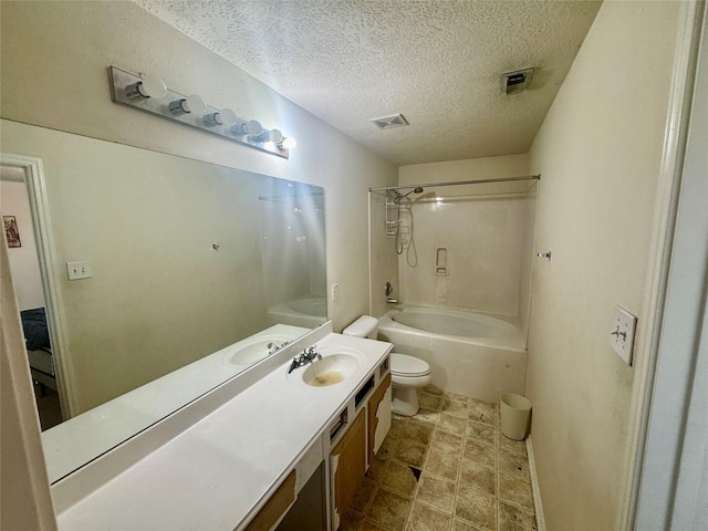 full bath with visible vents, toilet, a textured ceiling, shower / bathing tub combination, and vanity